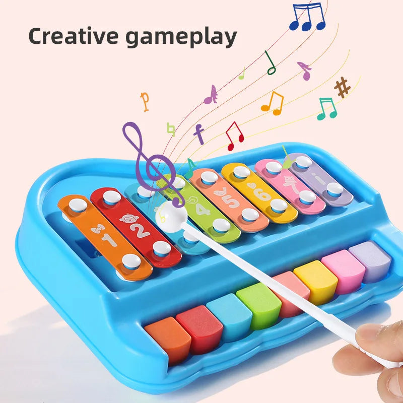 Toddler playing joyful melodies on a multi-octave xylophone and piano educational toy