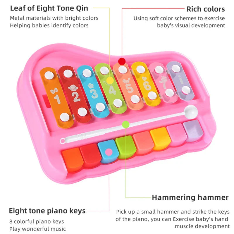 Close-up of a child's hands hitting keys on a vibrant musical toy, combining xylophone and piano