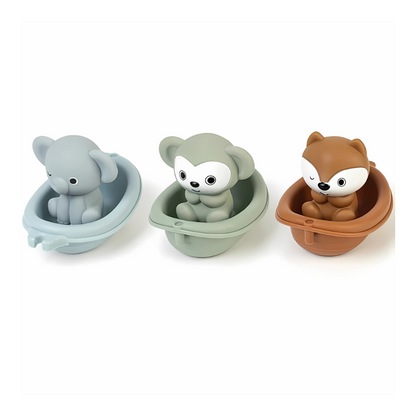 Durable floating animal bath toys made from ABS material, ideal for stimulating baby's motor skills.