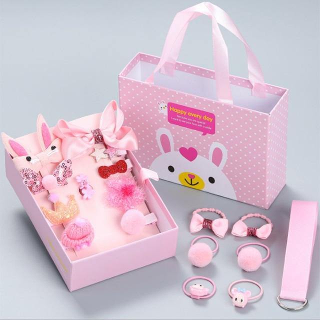 Assortment of vibrant girls' hair accessories: colorful clips, bows & bands, presented in a lovely gift box.
