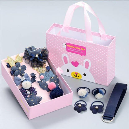 Close-up of colorful girls' hair clips & soft microfiber hair bands from the accessory gift box.
