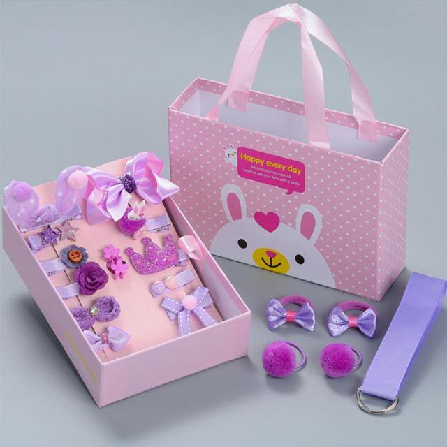 Convenient girls' hair accessories gift box with assorted clips & bands, an ideal present for young girls.