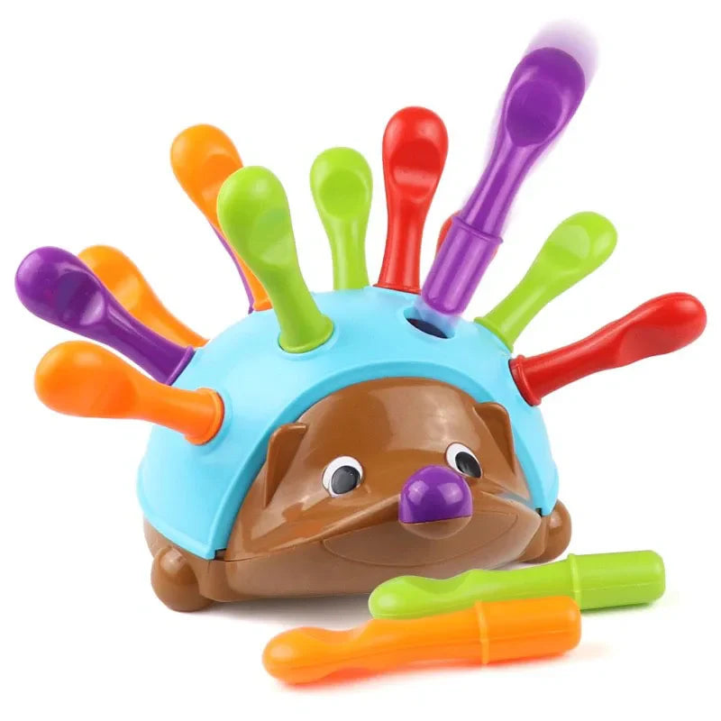 Colorful hedgehog toy with removable quills for toddler sensory and motor skill development
