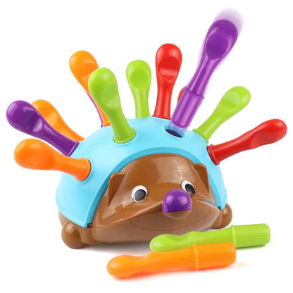 Colorful hedgehog toy with removable quills for toddler sensory and motor skill development