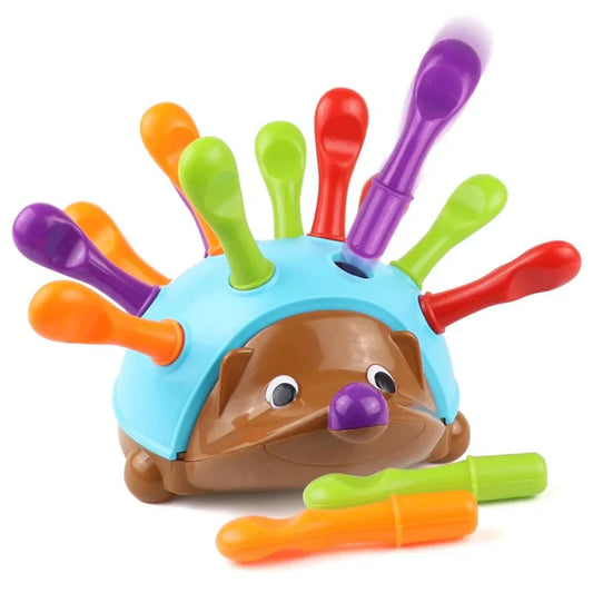 Colorful hedgehog toy with removable quills for toddler sensory and motor skill development