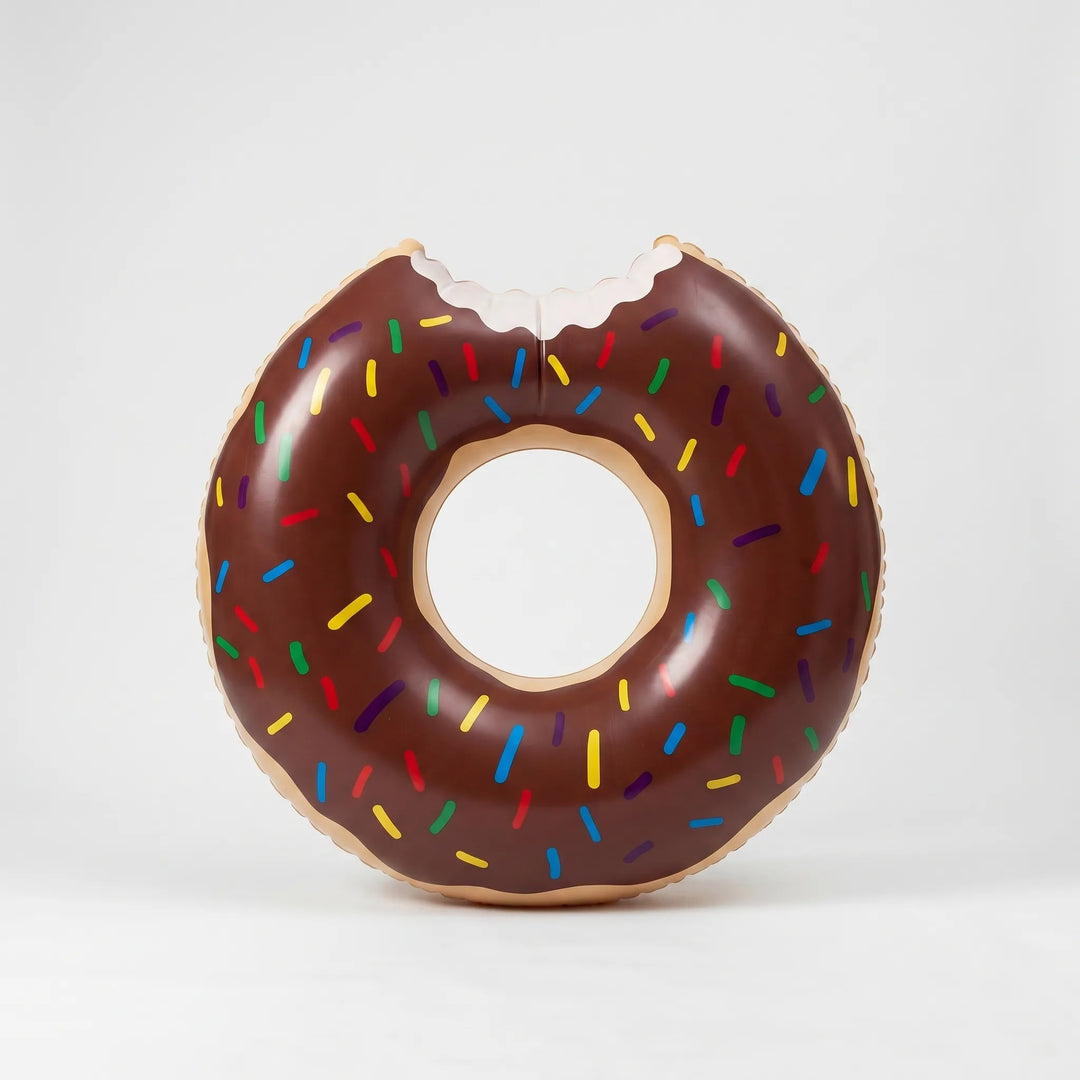 Fun inflatable donut pool ring for ultimate summer relaxation. A colorful pool lounger & essential water toy.
