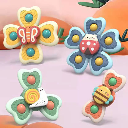 Colorful insect spinning tops with suction cups for toddlers, promotes fine motor skills education.