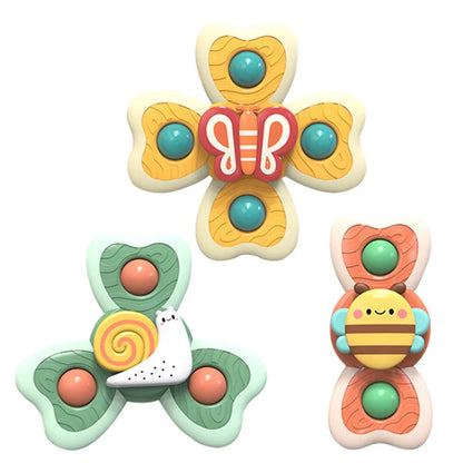 Suction toy insect spinning tops, colorful and durable for toddlers, aids in early fine motor skills.