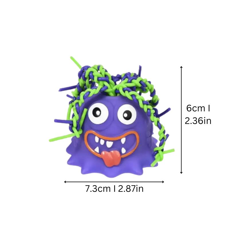 Child happily playing with a vibrant interactive monster toy, great for sensory development.
