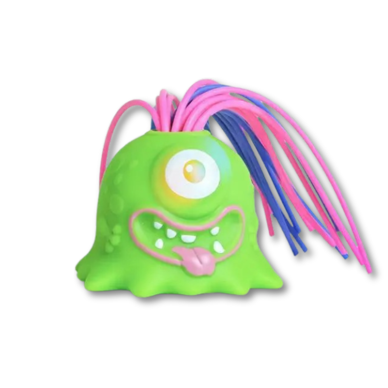 Adult squeezing an interactive monster toy, demonstrating its stress relief benefits.