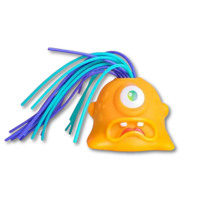 Soft, squishable interactive monster toy in bright colors, perfect for anxiety relief.