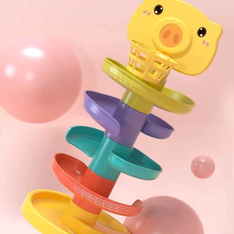Set of plastic balls included with the stacking ball drop toy, designed for small hands
