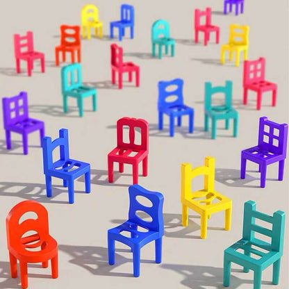 Toddler stacking small plastic chairs in vibrant colors, an educational fine motor skills game