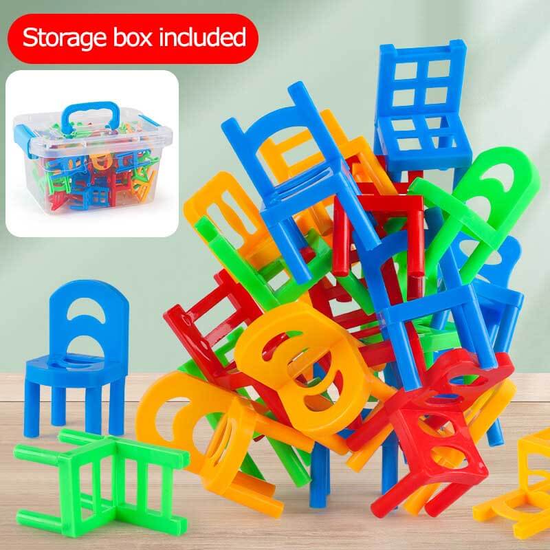Close-up of a child's hands carefully stacking colorful chairs in a balance game, fine motor