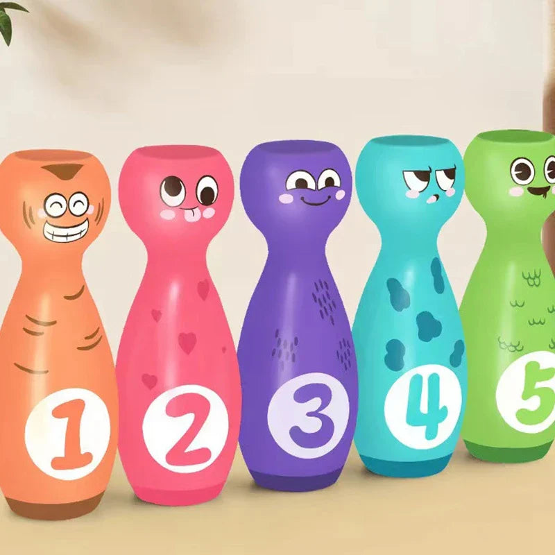 Child happily knocking down pins with the colorful bowling ball from their new sports toy game.