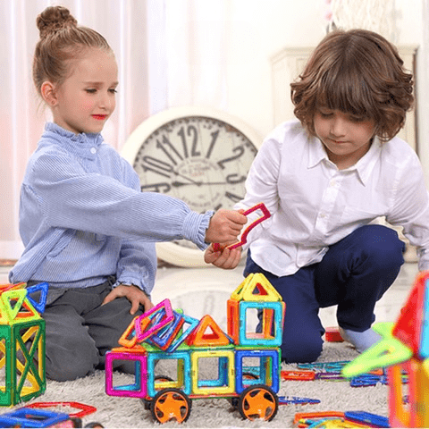 Vibrant magnetic building tiles for kids, connecting easily to construct towers & shapes, fostering spatial reasoning.