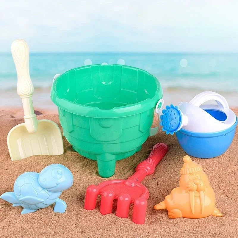 Children's beach play set featuring various sand toys, perfect for summer fun and water play