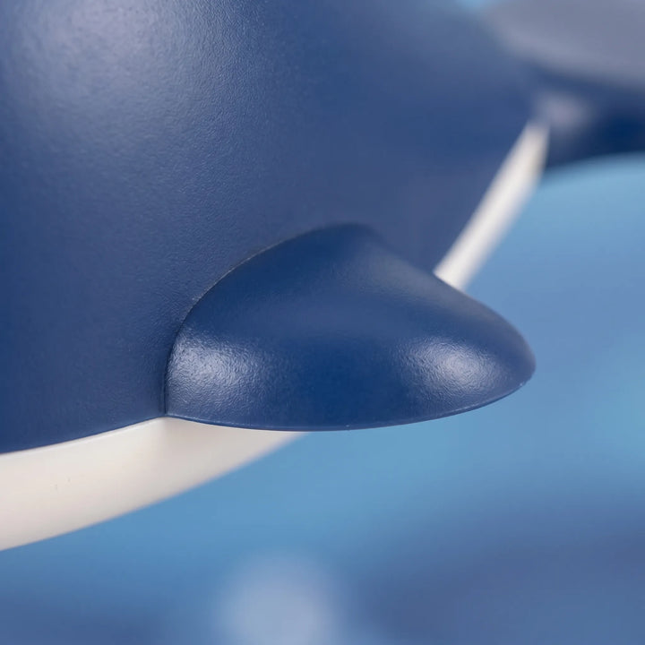 Blue and green wind-up floating whale bath toy set. Children's battery-free water fun toy.