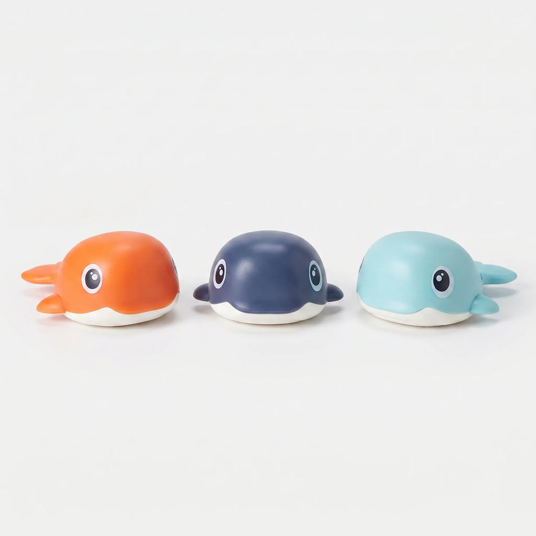 Kids' wind-up floating whale bath toy set. Multiple whales for battery-free water fun and toddler playtime.