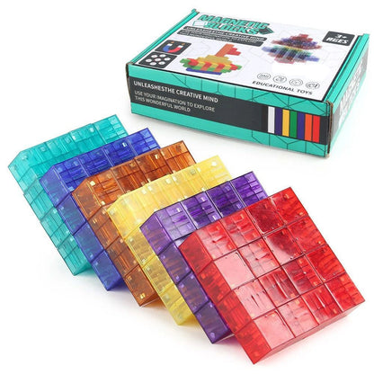 Assortment of magnetic building pieces forming a geometric structure, fostering creativity
