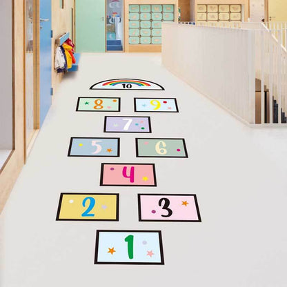 Playroom wall decorated with bright number decals, enhancing a child's educational environment.