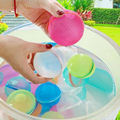Colorful reusable water balloons for kids' summer outdoor fun; eco-friendly splash toys in a garden.