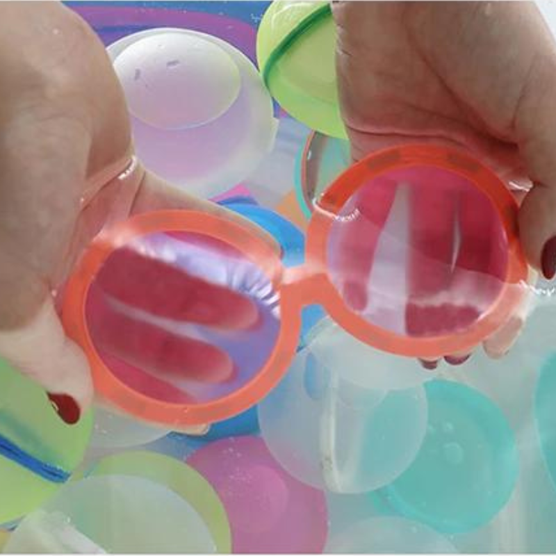Set of vibrant silicone reusable water balloons, perfect for summer games and bath, eco-friendly toy.