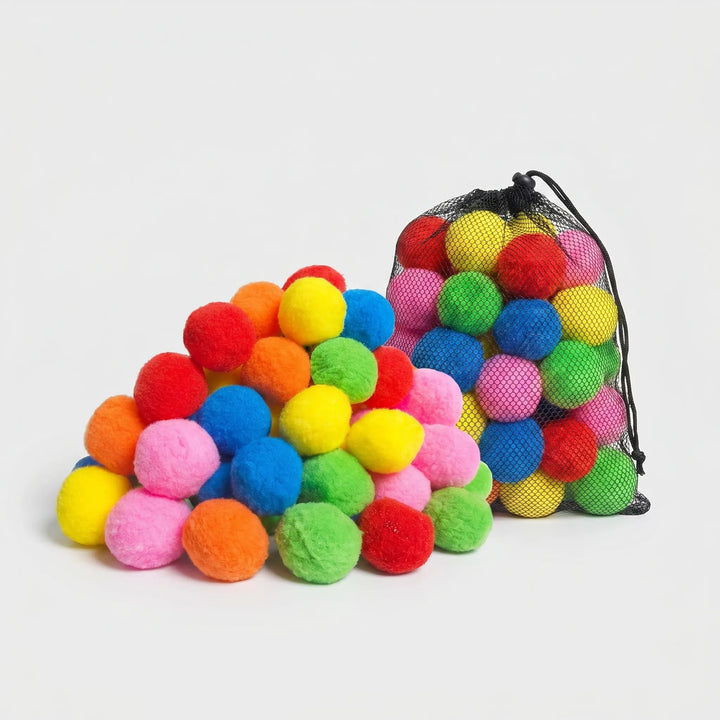 Children laughing while playing with soft, reusable water splash balls in a backyard, ideal for summer water games.