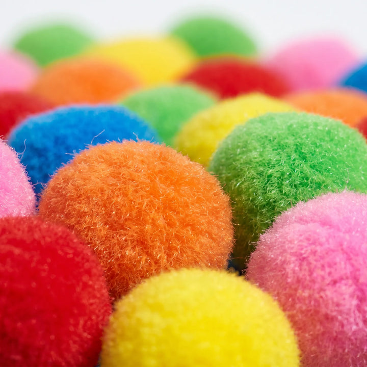 Vibrant eco-friendly reusable splash balls, a fun alternative to water balloons for kids' outdoor summer play.