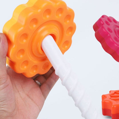 Baby gift: multi-colored stacking tower toy, designed for fun and skill development in young children.