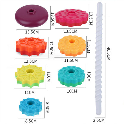 Interactive children's toy: rotating stacker with various colored rings, promotes fine motor skills.