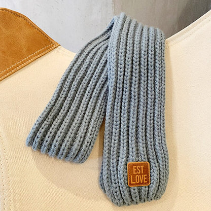 Warm tube scarf for children in a soft knit, ideal for cold weather, a cozy baby clothing item.