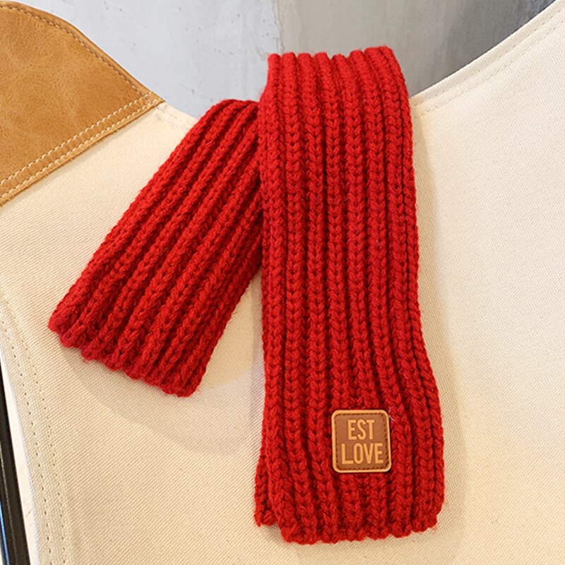 Colorful tube scarf made from soft knit, designed for kids, provides warmth in cold weather.