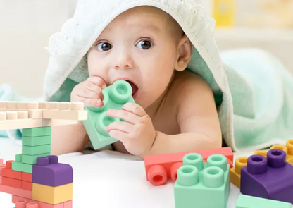 Close-up of soft silicone building blocks, showing detailed textures suitable as teething toys