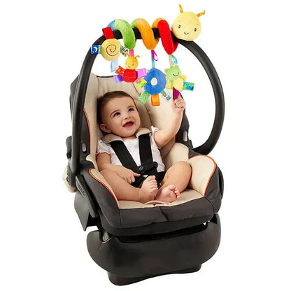 Car seat spiral toy with hanging plush lion, monkey, and elephant; provides sensory play on the go for babies.