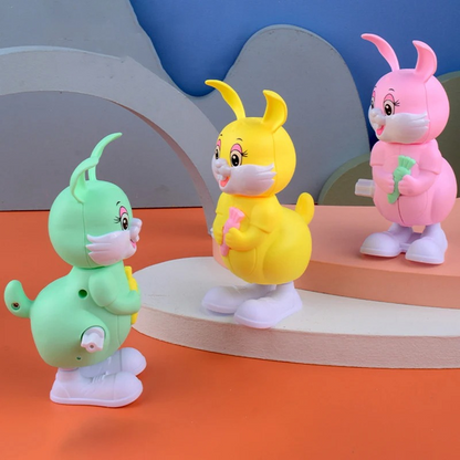 Colorful wind-up bouncing bunny toy for toddlers, promoting motor skills and endless fun, indoor/outdoor play