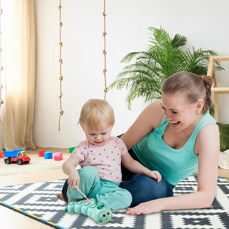 Toddler wind-up caterpillar toy, a vibrant educational toy for kids to enhance crawling and motor skills.
