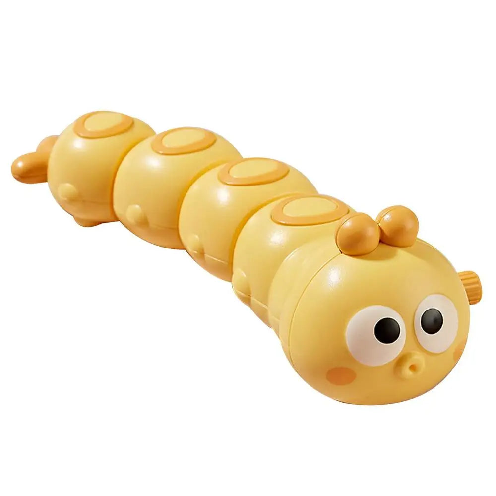 Brightly colored wind-up crawling caterpillar toy on a play mat, ideal for baby activity and learning.