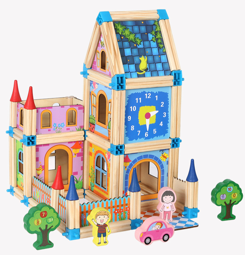 Happy child playing with a new wooden construction set, a great children's gift for creative development.