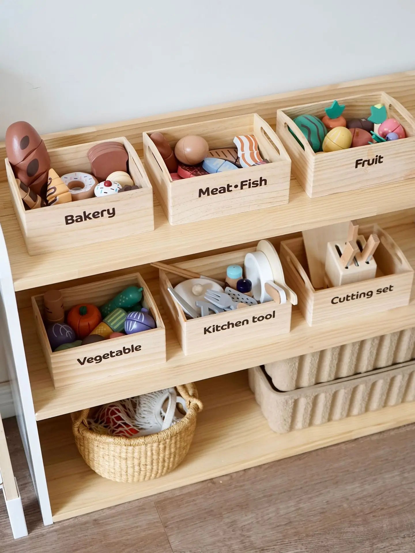 Toddler-friendly wooden play food set with durable, painted pieces for hours of fun kitchen role play.