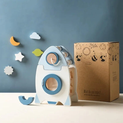 Montessori-inspired wooden rocket building blocks, an educational toy for creative kids play.