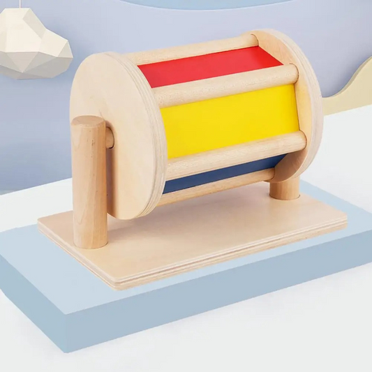 Colorful wooden spinning drum toy for toddlers, promotes sensory development & motor skills, baby activity toy