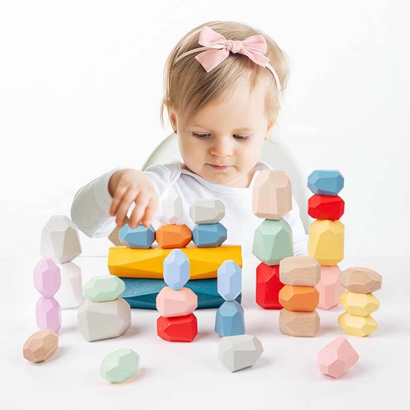 Colorful wooden stacking balancing rock blocks set for toddlers, Montessori educational toy.