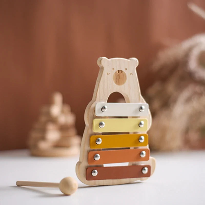Engaging baby wooden xylophone for sensory play, developing fine motor skills & sound exploration.