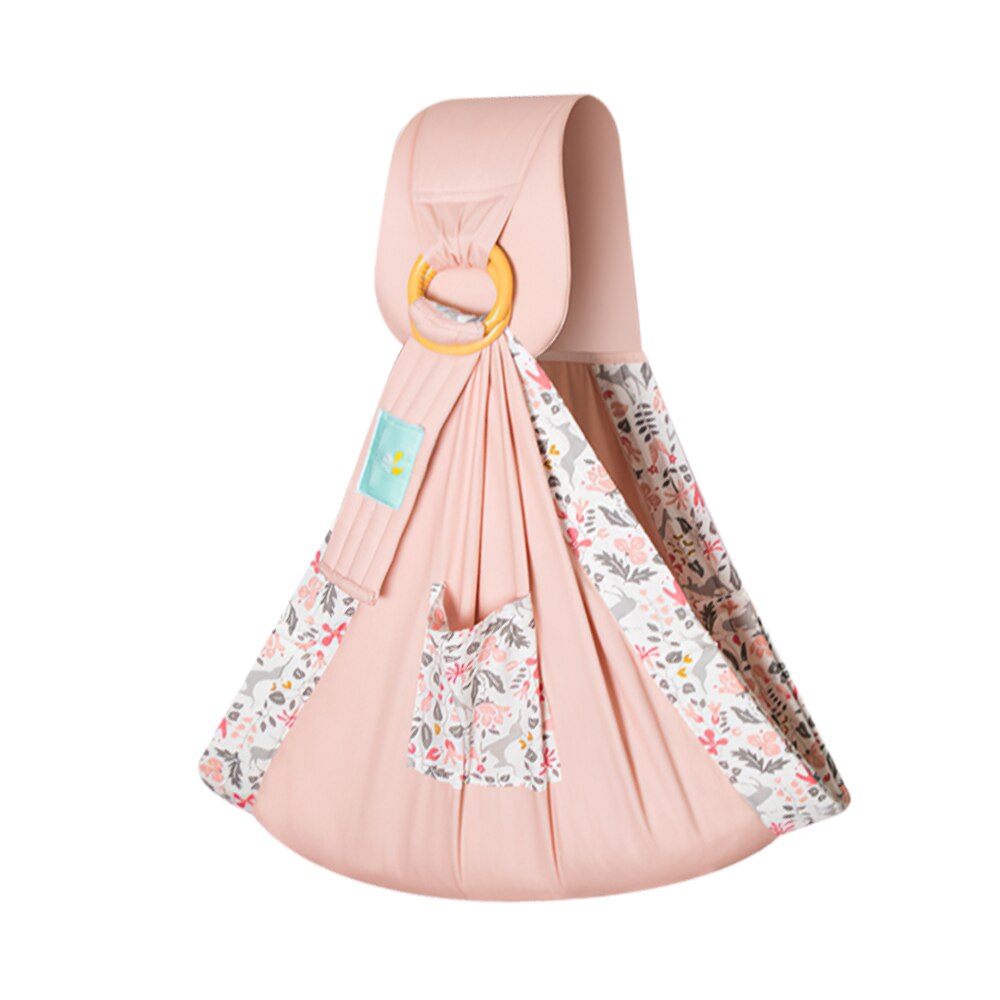 Mother and baby enjoying outdoor activity with the grey Comfort 3-in-1 baby sling, hands free