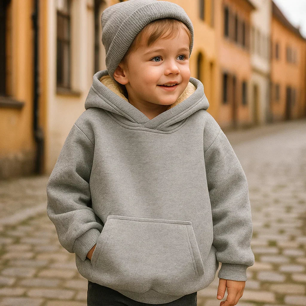 Loose fit children's hoodie for boys and girls, ideal for casual and winter fashion.