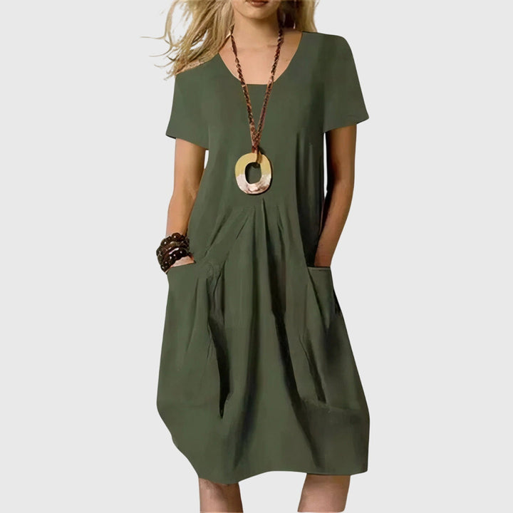 Stylish ladies' A-line dress with pockets, designed for ultimate comfort and relaxed everyday casual wear.