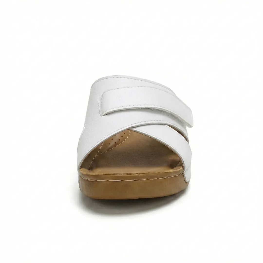 Women's travel-friendly orthopedic wedge sandals, compact and comfortably supportive.