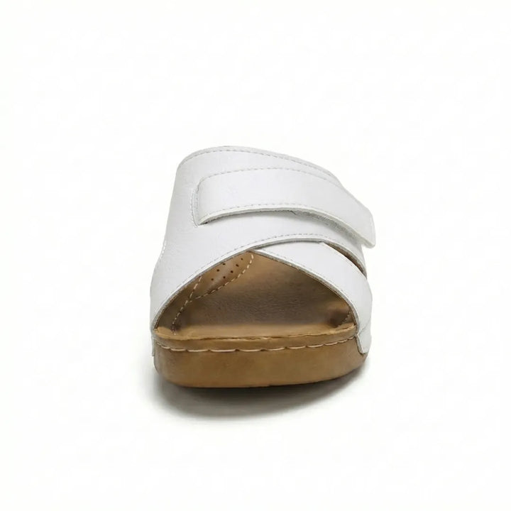 Women's travel-friendly orthopedic wedge sandals, compact and comfortably supportive.