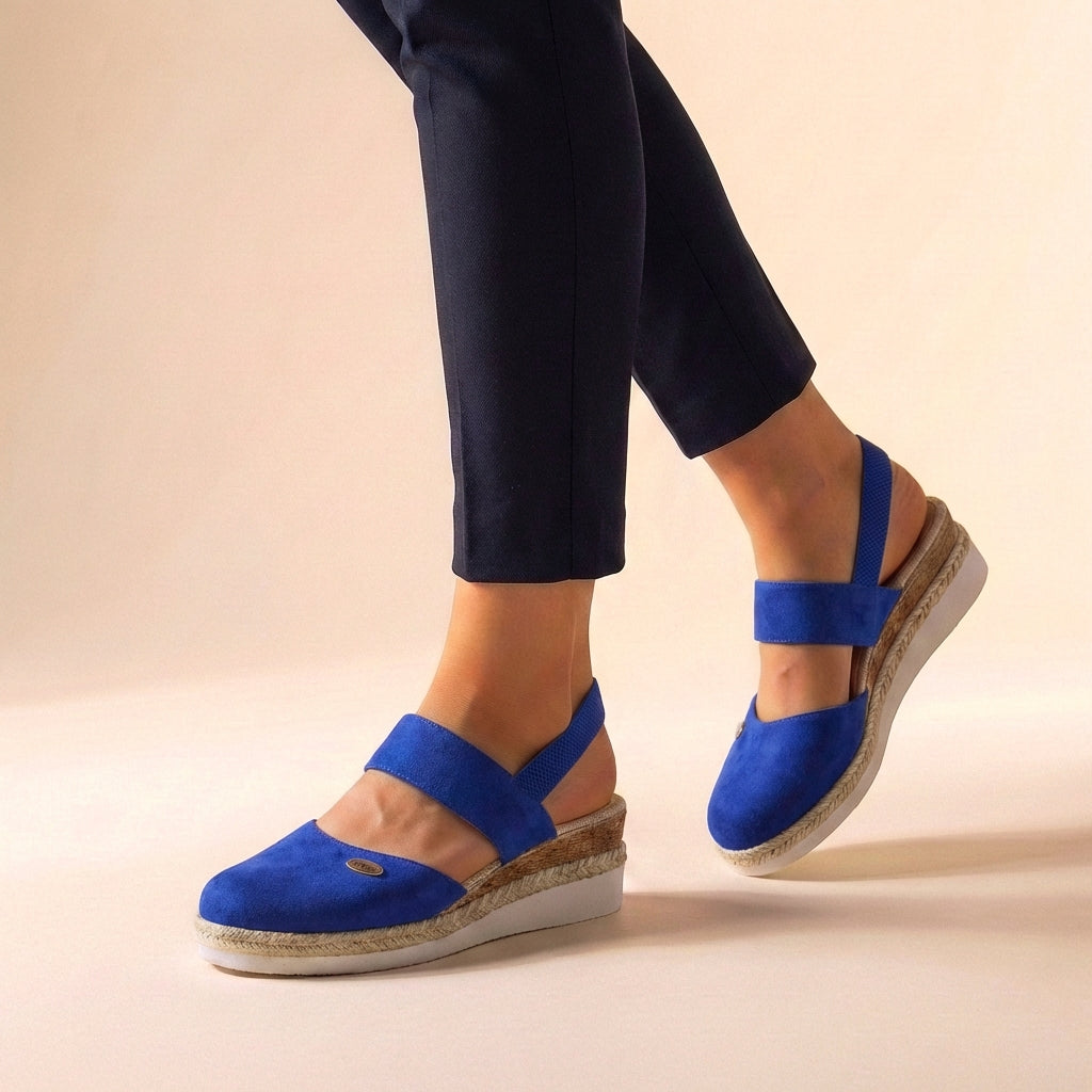 Close-up of comfortable women's espadrille platform sandals, showcasing summer style and design.